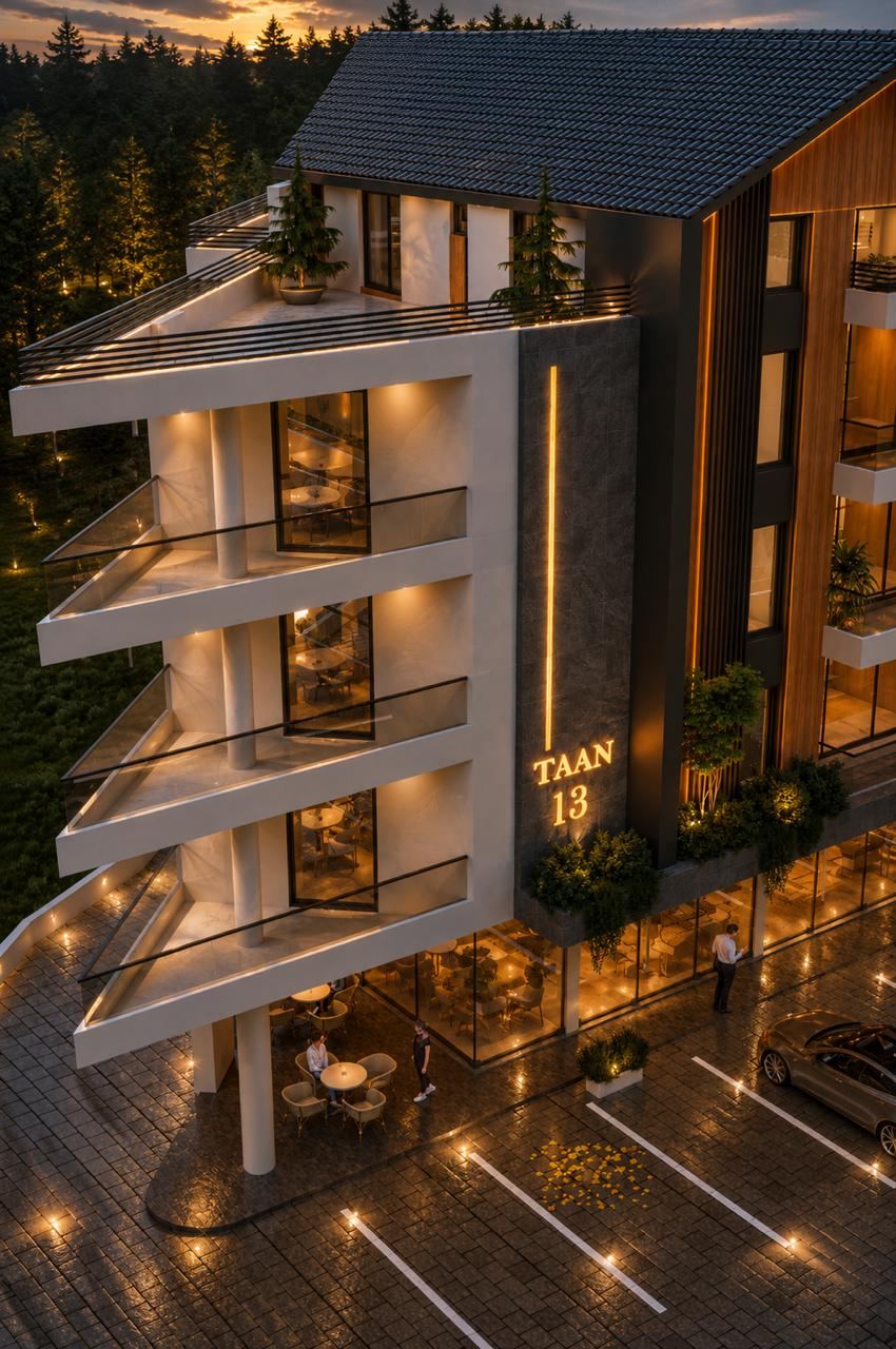 Dusk view of the lit entrance bay